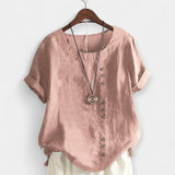 Nööpide ja lühikeste varrukatega pluus