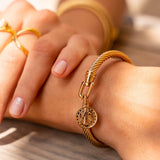 Kuldne käevõru mündiga