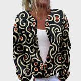 Elegantne mustriga kootud vest